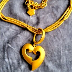 Givenchy Elegant & Luxurious Triple Strand Heart Necklace.
